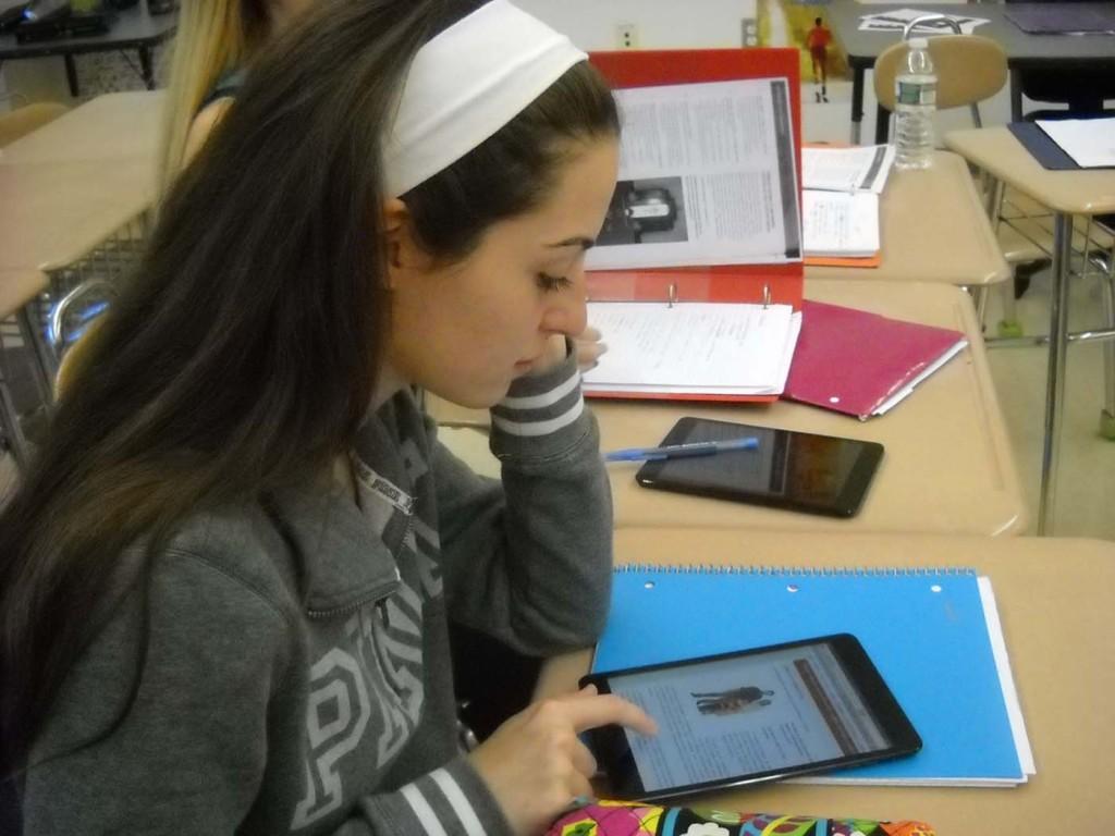 Senior Lindsey Leighton using one of the new iPad Minis purchased for the World Languages Department
