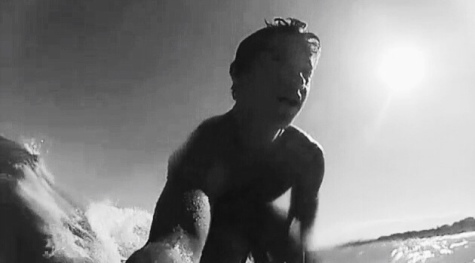 Greco-Byrne films himself surfing in the ocean for his video featuring the song On Top by Flume.