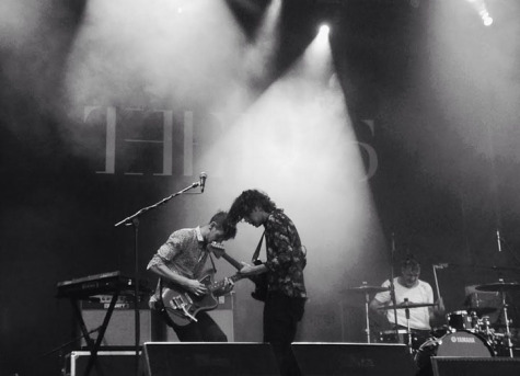 Healy performs beside guitar player Adam Hann in “Girls.”