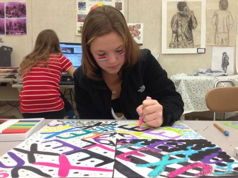 Sophomore Alexus Barber works on an art project in Adaptive Art.