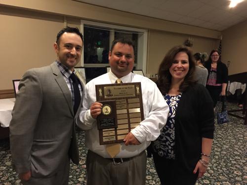 Mr. Adam Laliberte, center, is pictured alongside Mr. Mark DeLucia, left, and Mrs. Paula Schiavone, right. Laliberte recently won the Teacher of the Year Award from the Rhode Island Foreign Language Association.