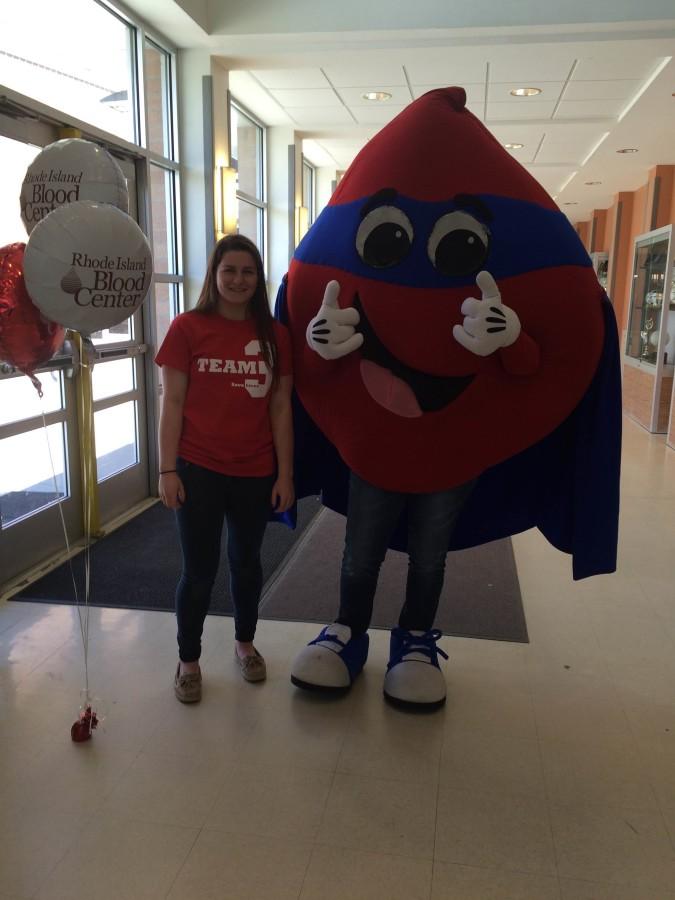 Sophomore Shannon Fain (left) is pictured with sophomore Sara Anoushian (right), who is disguised as Captain Hemoglobin. Both girls are ambassadors at NKHS for the Rhode Island Blood Center. 