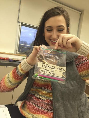 Senior Elise Felker displays her new pencil case that she made out of a zip-lock bag in order to stay more organized.