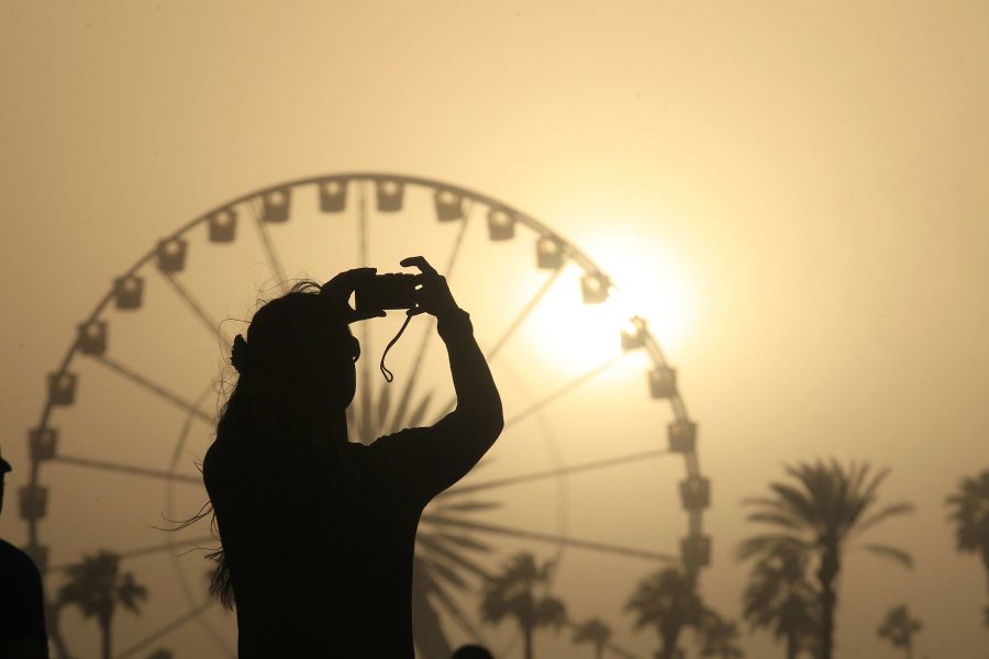 The sun sets on another day of the Coachella Music and Arts Festival on Sunday, April 14, 2013, in Indio, California. (Brian van der Brug/Los Angeles Times/MCT)