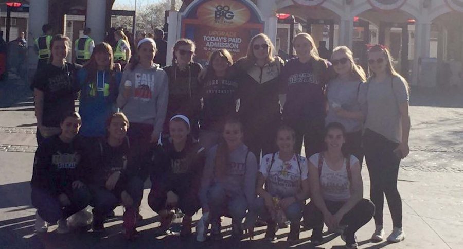 the NK Girls softball team pose outside 6 flags at a team trip they took over break.