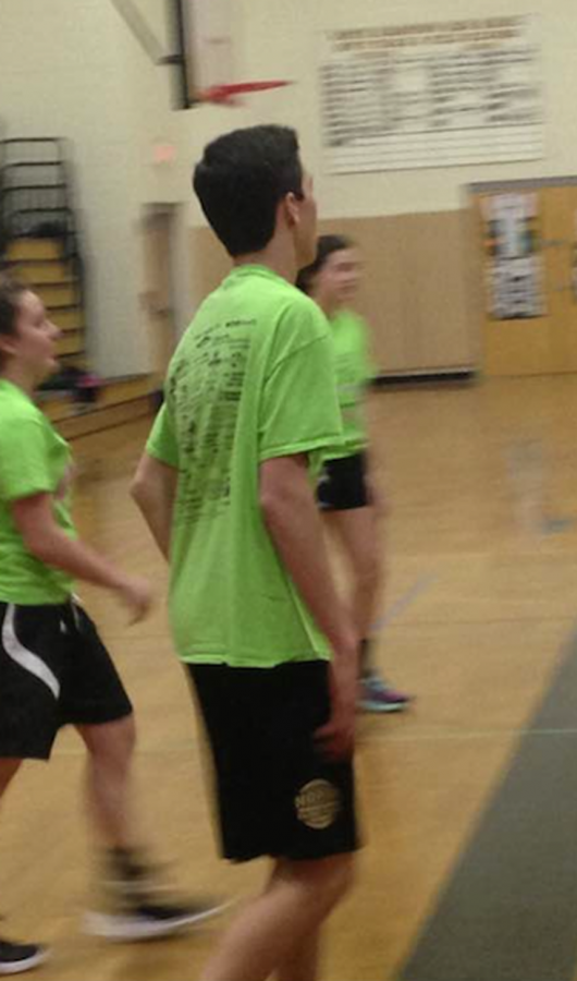 Senior Liam Curran takes part in his own senior project: a basketball tournament. 